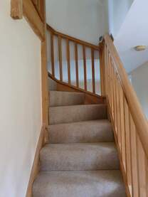 Picture of a domestic staircase that has been sanded and varnished to give a classic, chic look